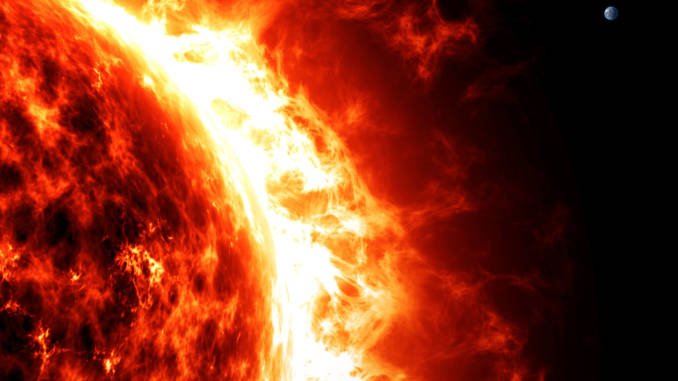 32371016 - sun and earth, proportions and sizes. space Pole magnetyczne