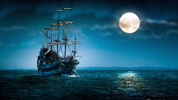 Sailing ship on the high seas in the night. Flying Dutchman by the Moon light. statek-widmo.jpg